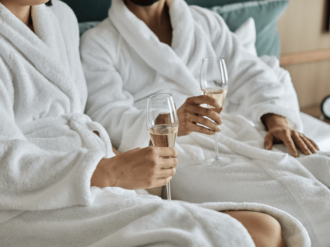 Spa Robes & Sparkling Wine in Bed